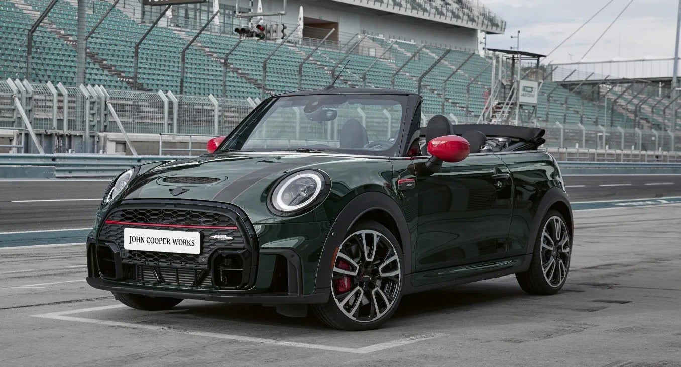 The JCW MINI Convertible zooming on the racetrack. | MINIDemo2 in Derwood MD